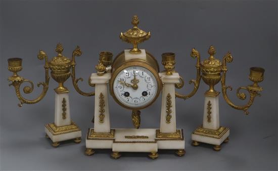 A Louis XVI style white marble and gilt-bronze garniture de cheminee, H 26cm W 17.5cm (clock)
